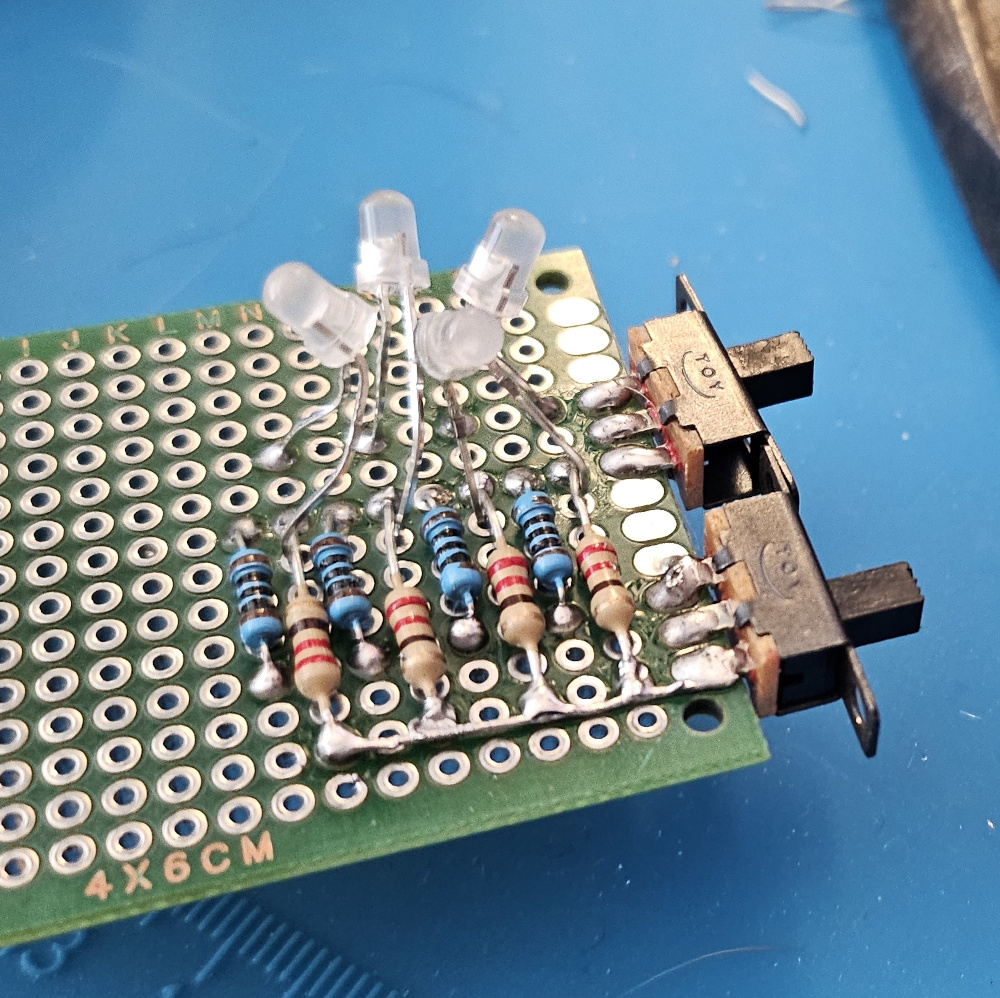 Initial circuit showing led aiming and lined up resistors.